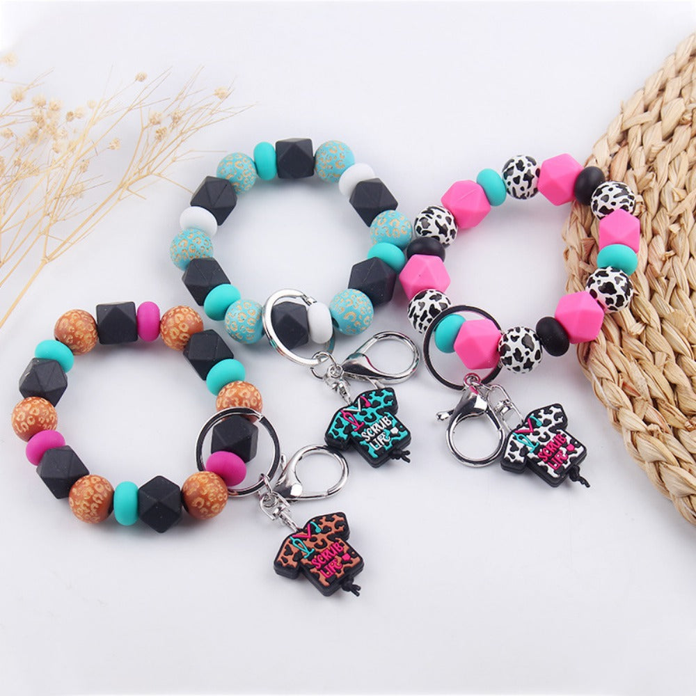 Wholesale Cartoon Nurse Uniform Silicone Beaded Wrist Keychain